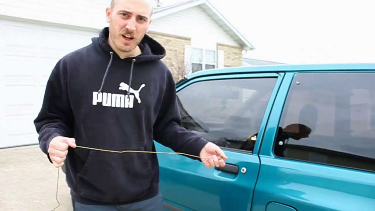 Unlocking car doors with a metal coat hanger