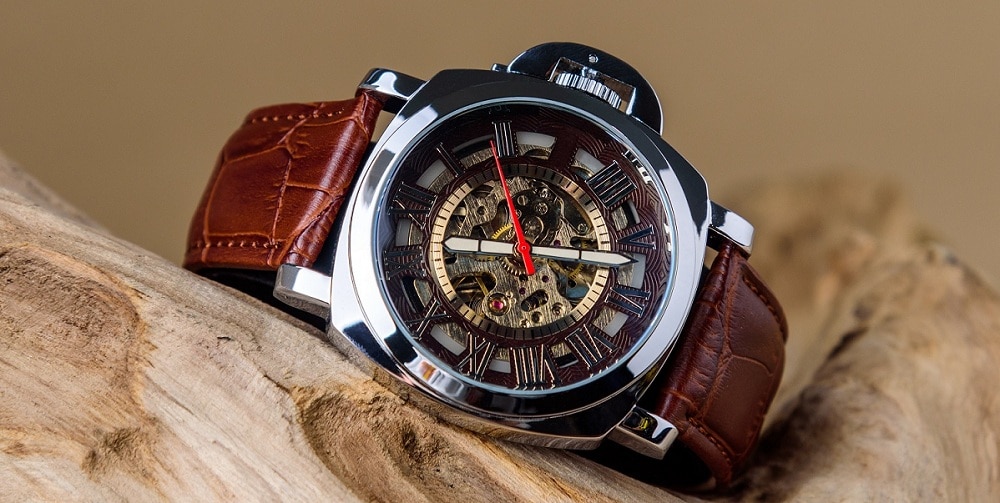 Close up of Luxury man wrist watches placed on timber in brown b