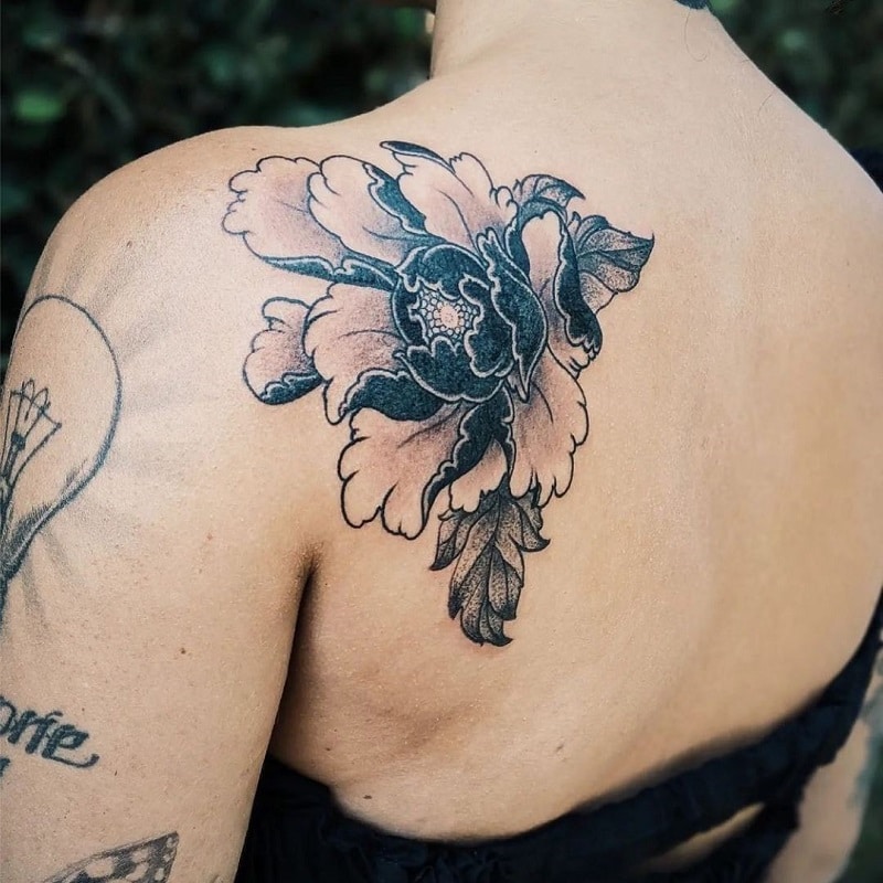 Black and white flower tattoo