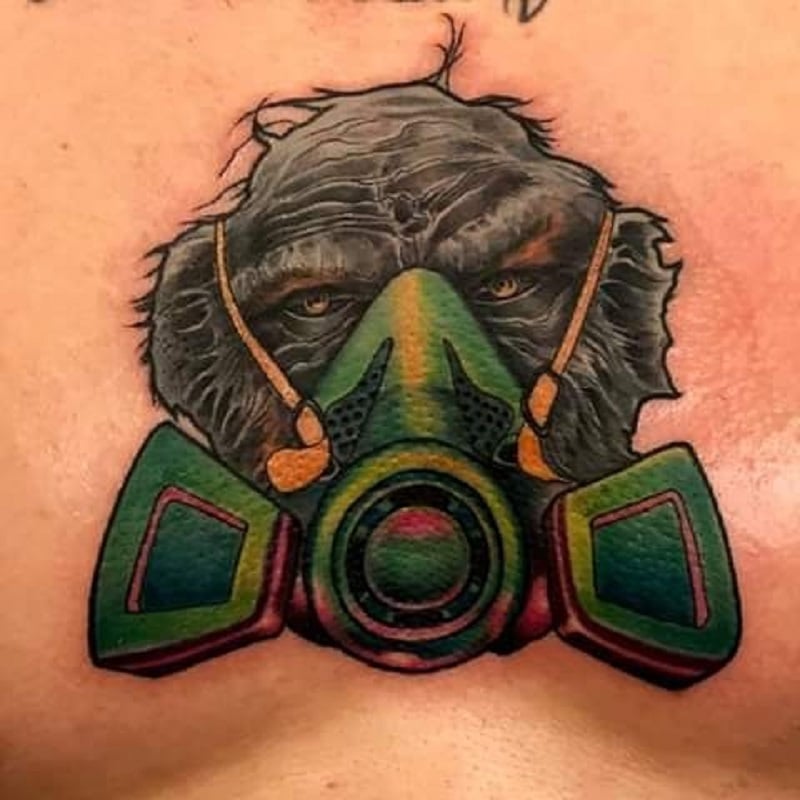Monkey with a gas mask tattoo