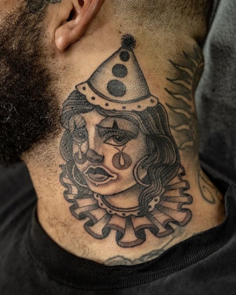 Sad lady clown tattoo