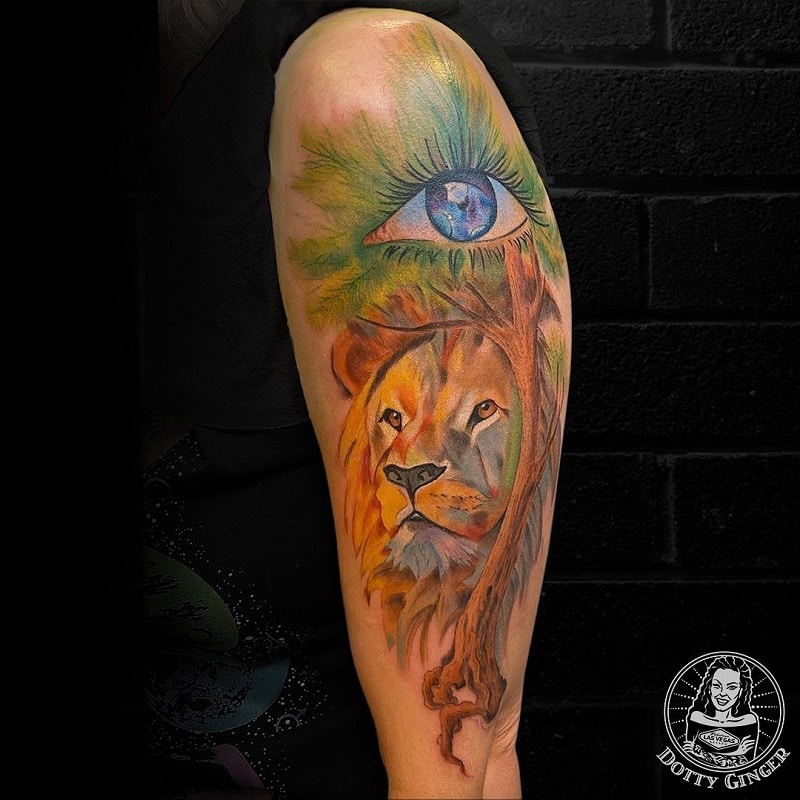 The Lion and the Eyes tattoo