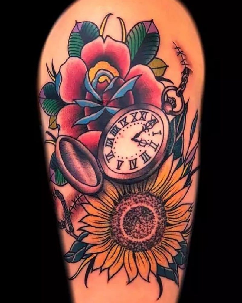 The pocket watch and flowers tattoo