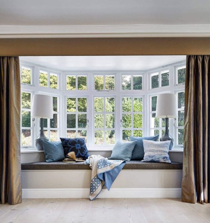 Bay window seat with curtains