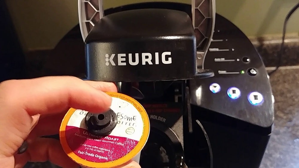 Replace your filter and reassemble the Keurig.